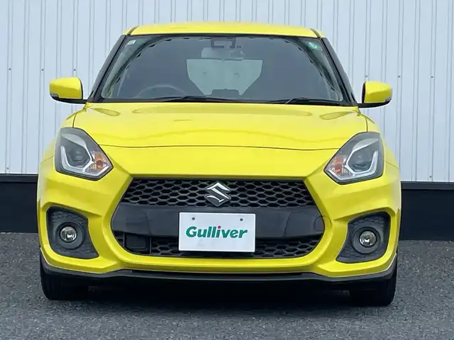 スズキ スイフト スポーツ セーフティPKG 千葉県 2017(平29)年 4.1万km チャンピオンイエロー 社外8インチナビ/（フルセグTV/BT/CD/DVD/FM/AM）/バックカメラ/ニュルスペックマフラー/衝突被害軽減システム/車線逸脱警報/クルーズコントロール/横滑り防止装置/ETC/ドライブレコーダー/LEDヘッドライト/リアフォグランプ/オートライト/ウィンカーミラー/電動格納ミラー/純正17インチAW/シートヒーター/プッシュスタート/スマートキー/フロアマット/ドアバイザー/スペアキー/取扱説明書/保証書