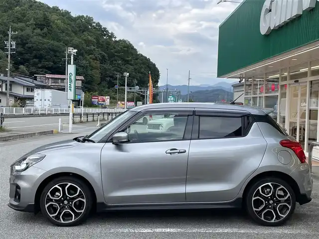 スズキ スイフト スポーツ 岐阜県 2022(令4)年 2.5万km プレミアムシルバーメタリック 純正ナビ/【Bluetooth．CD.DVD.AM/FMラジオ．iPod】/クルーズコントロール/パドルシフト/シートヒーター/スマートキー/LEDヘッドライト・オート機能付/フォグライト/ETC/純正アルミホイール/純正フロアマット/横滑り防止装置/ウィンカーミラー/ドアバイザー/取扱説明書/保証書/スペアキー