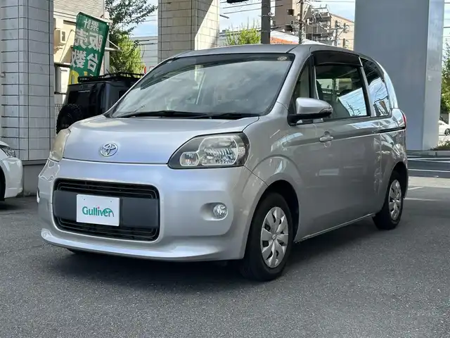トヨタ ポルテ X 愛知県 2013(平25)年 1.5万km シルバーM ワンオーナー/左リアパワースライドドア/純正CDオーディオ/オートライト機能付HIDヘッドライト/フォグランプ/アイドリングストップ/助手席シートバックテーブル/ウインカー付電格ミラー/助手席側内張り身長計測用メモリ/キーレスエントリー