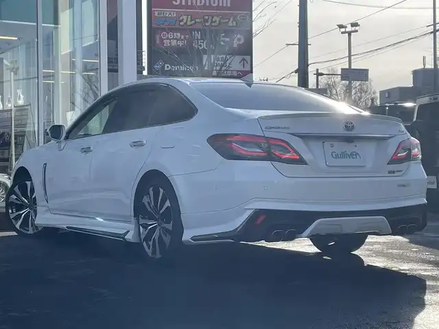 トヨタ クラウン ハイブリッド RS Four リミテッド 道央・札幌 2020(令2)年 6.9万km ホワイトパールクリスタルシャイン ・４WD/・ワンオーナー/・衝突軽減ブレーキ/・寒冷地仕様/・全方位カメラ/・モデリスタエアロ/・モデリスタマフラー/・パワーシート/・純正ナビ/　CD＆BT＆USB＆TV/・バックカメラ/・ブラインドスポットモニター/・デジタルインナーミラー/・ハーフレザーシート/・コーナーセンサー/・レーンキープアシスト/・レーダークルーズコントロール/・パーキングアシスト/・オートエアコン/・オートライト/・オートリトラミラー/・レインセンサーワイパー/・シートヒーター/・ワイパーデアイサー/・純正エンジンスターター/・MT付きAT/・ビルトインETC/・プッシュスタート/・スマートキー/・純正フロアマット/・ドアバイザー/・ウィンカーミラー/・フォグライト/・LEDヘッドライト/・モデリスタ19インチAW