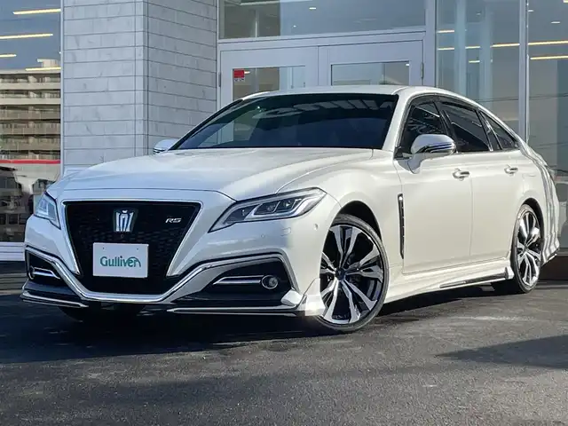 トヨタ クラウン ハイブリッド RS Four リミテッド 道央・札幌 2020(令2)年 6.9万km ホワイトパールクリスタルシャイン ・４WD/・ワンオーナー/・衝突軽減ブレーキ/・寒冷地仕様/・全方位カメラ/・モデリスタエアロ/・モデリスタマフラー/・パワーシート/・純正ナビ/　CD＆BT＆USB＆TV/・バックカメラ/・ブラインドスポットモニター/・デジタルインナーミラー/・ハーフレザーシート/・コーナーセンサー/・レーンキープアシスト/・レーダークルーズコントロール/・パーキングアシスト/・オートエアコン/・オートライト/・オートリトラミラー/・レインセンサーワイパー/・シートヒーター/・ワイパーデアイサー/・純正エンジンスターター/・MT付きAT/・ビルトインETC/・プッシュスタート/・スマートキー/・純正フロアマット/・ドアバイザー/・ウィンカーミラー/・フォグライト/・LEDヘッドライト/・モデリスタ19インチAW