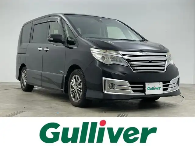日産 セレナ ライダー S HV Aセーフティ 岡山県 2015(平27)年 6万km ダイヤモンドブラック 純正8インチSDナビ(MM514D-L）/(Bluetooth/CD/AUX/DVD有)/11インチ純正フリップダウンモニター/アラウンドビューモニター/両側パワースライドドア/ビルトインETC/LEDヘッドライト/クルーズコントロール/エマージェンシーブレーキ/ドライブレコーダー(社外・前)/純正フロアマット/純正アルミホイール/コーナーセンサー(前後)/レーンアシスト/踏み間違い衝突防止アシスト