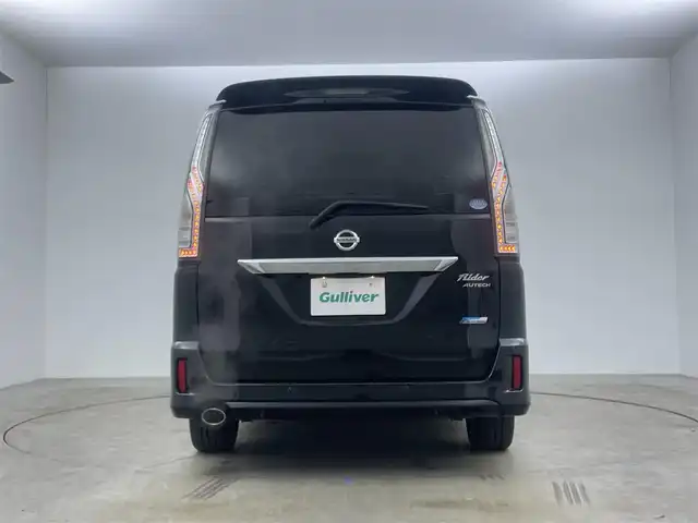 日産 セレナ ライダー S HV Aセーフティ 岡山県 2015(平27)年 6万km ダイヤモンドブラック 純正8インチSDナビ(MM514D-L）/(Bluetooth/CD/AUX/DVD有)/11インチ純正フリップダウンモニター/アラウンドビューモニター/両側パワースライドドア/ビルトインETC/LEDヘッドライト/クルーズコントロール/エマージェンシーブレーキ/ドライブレコーダー(社外・前)/純正フロアマット/純正アルミホイール/コーナーセンサー(前後)/レーンアシスト/踏み間違い衝突防止アシスト