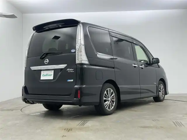 日産 セレナ ライダー S HV Aセーフティ 岡山県 2015(平27)年 6万km ダイヤモンドブラック 純正8インチSDナビ(MM514D-L）/(Bluetooth/CD/AUX/DVD有)/11インチ純正フリップダウンモニター/アラウンドビューモニター/両側パワースライドドア/ビルトインETC/LEDヘッドライト/クルーズコントロール/エマージェンシーブレーキ/ドライブレコーダー(社外・前)/純正フロアマット/純正アルミホイール/コーナーセンサー(前後)/レーンアシスト/踏み間違い衝突防止アシスト