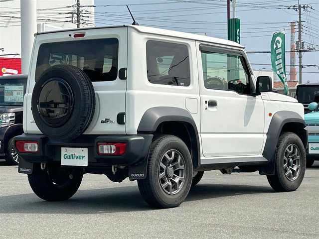 スズキ ジムニー シエラ JL 静岡県 2018(平30)年 11.3万km スペリアホワイト エンジンスタートボタン/パワーステアリング/パワーウィンドウ/4WD/オートエアコン/スマーキー/ETC/純正SDナビ（BT接続、フルセグTV、DVD再生可能）/前方ドライブレコーダー/純正フロアマット/布系シート/D＋N席シートヒーター/背面タイヤ/純正アルミホイール/ABS/横滑り防止装置/ダウンヒルアシストコントロール/ハロゲンヘッドライト/W＋サイドエアバック