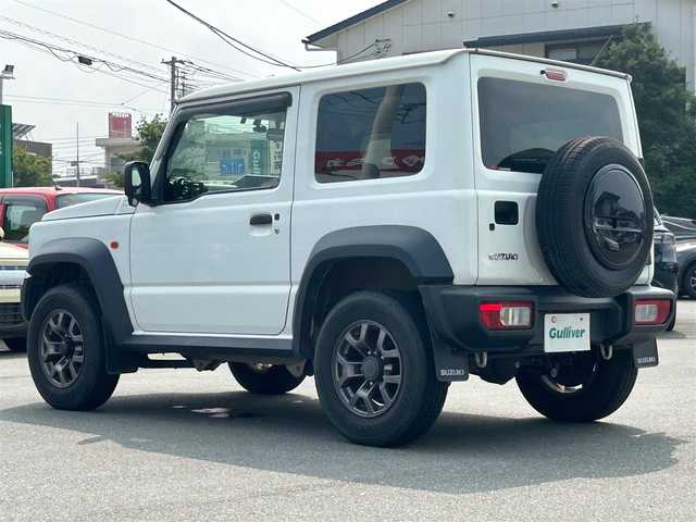 スズキ ジムニー シエラ JL 静岡県 2018(平30)年 11.3万km スペリアホワイト エンジンスタートボタン/パワーステアリング/パワーウィンドウ/4WD/オートエアコン/スマーキー/ETC/純正SDナビ（BT接続、フルセグTV、DVD再生可能）/前方ドライブレコーダー/純正フロアマット/布系シート/D＋N席シートヒーター/背面タイヤ/純正アルミホイール/ABS/横滑り防止装置/ダウンヒルアシストコントロール/ハロゲンヘッドライト/W＋サイドエアバック
