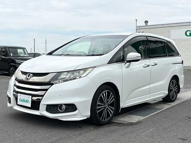 ホンダ オデッセイ 香川県 2015(平27)年 8.6万km ホワイトオーキッドパール 純正ナビゲーション/フルセグＴＶ/バックカメラ/両側パワースライドドア/リアフリップダウンモニター/レーダークルーズ/パワーシート/コーナーセンサー/LEDライト/パドルシフト