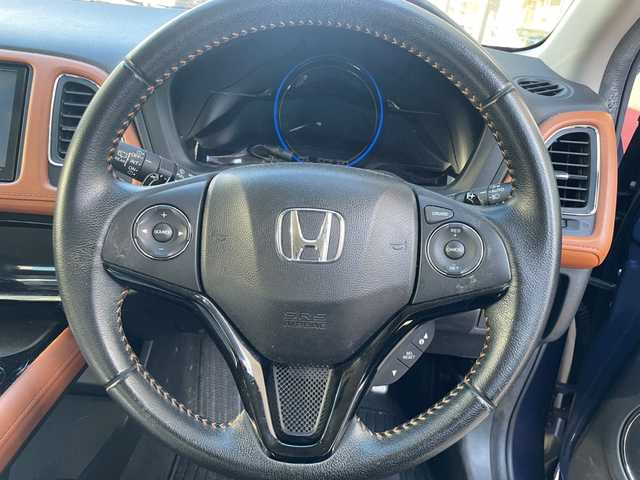 ホンダ ヴェゼル ハイブリッド Z 福岡県 2014(平26)年 9.2万km モルフォブルーP 純正ナビ/ワンセグテレビ/バックカメラ/クルーズコントロール/ETC/LEDヘッドライト/ハーフレザーシート/シートヒーター