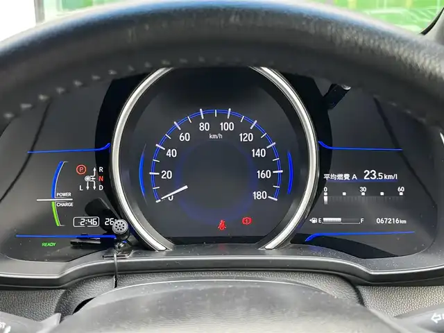 ホンダ フィット ハイブリット Sパッケージ 奈良県 2013(平25)年 6.8万km ブリリアントスポーティブルーメタリック2トーン 純正７インチナビ（VXM-145VFi/（フルセグ／ＢＴ／ＣＤ／ＤＶＤ）/クルーズコントロール/バックカメラ/横滑り防止/オートライト/電動格納ミラー/ステアリングスイッチ/ＬＥＤヘッドライト/プッ）シュスタート/ETC/純正16インチＡＷ/保証書/取り扱い説明書/スペアキーX1