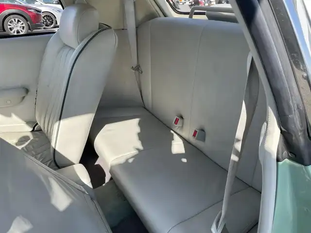 日産 フィガロ フルオープントップ 長崎県 1991(平3)年 8.8万km 緑 全国2万台限定車/社外オーディオ/白本革シート/ETC