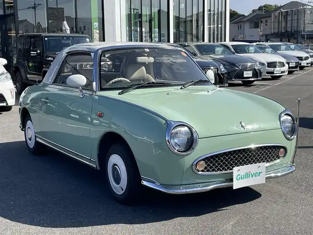 日産 フィガロ フルオープントップ 長崎県 1991(平3)年 8.8万km 緑 全国2万台限定車/社外オーディオ/白本革シート/ETC