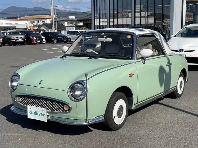 日産 フィガロ フルオープントップ 長崎県 1991(平3)年 8.8万km 緑 全国2万台限定車/社外オーディオ/白本革シート/ETC
