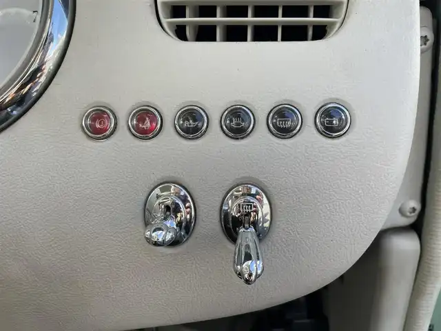 日産 フィガロ フルオープントップ 長崎県 1991(平3)年 8.8万km 緑 全国2万台限定車/社外オーディオ/白本革シート/ETC