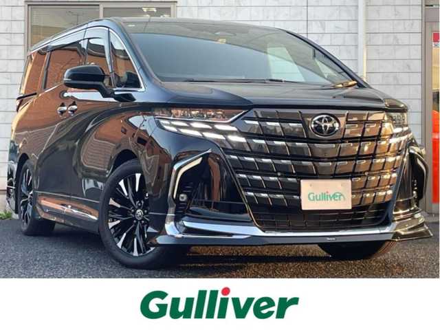 トヨタ アルファードハイブリット エグゼクティブ ラウンジ 福岡県 2025(令7)年 1.3万km ブラック ワンオーナー/モデリスタ/エアロ(フロント/サイド/リヤ)/マルチカラーインテリアイルミ/左右独立ムーンルーフ/純正14インチフリップダウンモニター/JBLサウンド/ユニバーサルステップ左右/デジタルインナーミラー/純正14インチコネクテッドナビ/(Bluetooth/Miracast/フルセグTV)/パノラミックビューモニター/トヨタチームメイト/アドバンストパーク/アドバンスドドライブ/トヨタセーフティセンス/プリクラッシュセーフティ/レーントディパーチャーアラート/レーンチェンジアシスト/レーダークルーズコントロール/ブラインドスポットモニター/安心降車アシスト/周辺車両接近時サポート/プロアクティブドライビングアシスト/フロント/リヤクロストラフィックアラート/リヤカメラディテクション/パワーバックドア/黒色レザーシート/ヘッドアップディスプレイ/ステアリングヒーター/パワーシート/シートヒーター/ベンチレーション(1.2列目)/シートメモリー/2列目/オットマン＆アームレストヒーター/リヤマルチオペレーションパネル/シート操作スイッチ/置くだけ充電
