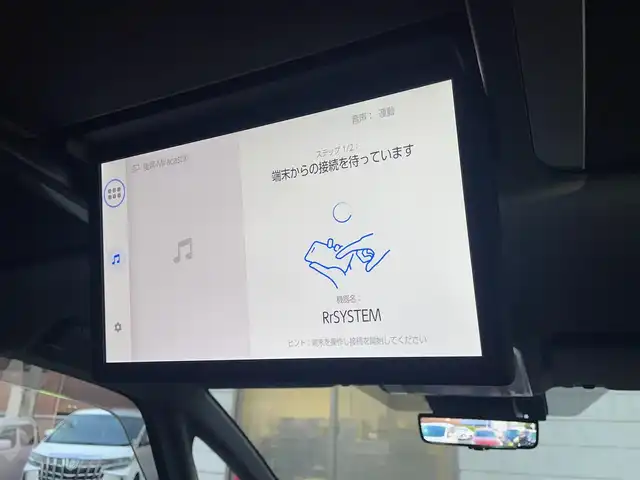 トヨタ アルファードハイブリット エグゼクティブ ラウンジ 福岡県 2025(令7)年 1.3万km ブラック ワンオーナー/モデリスタ/エアロ(フロント/サイド/リヤ)/マルチカラーインテリアイルミ/左右独立ムーンルーフ/純正14インチフリップダウンモニター/JBLサウンド/ユニバーサルステップ左右/デジタルインナーミラー/純正14インチコネクテッドナビ/(Bluetooth/Miracast/フルセグTV)/パノラミックビューモニター/トヨタチームメイト/アドバンストパーク/アドバンスドドライブ/トヨタセーフティセンス/プリクラッシュセーフティ/レーントディパーチャーアラート/レーンチェンジアシスト/レーダークルーズコントロール/ブラインドスポットモニター/安心降車アシスト/周辺車両接近時サポート/プロアクティブドライビングアシスト/フロント/リヤクロストラフィックアラート/リヤカメラディテクション/パワーバックドア/黒色レザーシート/ヘッドアップディスプレイ/ステアリングヒーター/パワーシート/シートヒーター/ベンチレーション(1.2列目)/シートメモリー/2列目/オットマン＆アームレストヒーター/リヤマルチオペレーションパネル/シート操作スイッチ/置くだけ充電