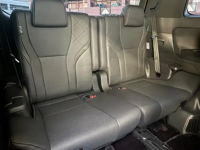 トヨタ アルファードハイブリット エグゼクティブ ラウンジ 福岡県 2025(令7)年 1.3万km ブラック ワンオーナー/モデリスタ/エアロ(フロント/サイド/リヤ)/マルチカラーインテリアイルミ/左右独立ムーンルーフ/純正14インチフリップダウンモニター/JBLサウンド/ユニバーサルステップ左右/デジタルインナーミラー/純正14インチコネクテッドナビ/(Bluetooth/Miracast/フルセグTV)/パノラミックビューモニター/トヨタチームメイト/アドバンストパーク/アドバンスドドライブ/トヨタセーフティセンス/プリクラッシュセーフティ/レーントディパーチャーアラート/レーンチェンジアシスト/レーダークルーズコントロール/ブラインドスポットモニター/安心降車アシスト/周辺車両接近時サポート/プロアクティブドライビングアシスト/フロント/リヤクロストラフィックアラート/リヤカメラディテクション/パワーバックドア/黒色レザーシート/ヘッドアップディスプレイ/ステアリングヒーター/パワーシート/シートヒーター/ベンチレーション(1.2列目)/シートメモリー/2列目/オットマン＆アームレストヒーター/リヤマルチオペレーションパネル/シート操作スイッチ/置くだけ充電