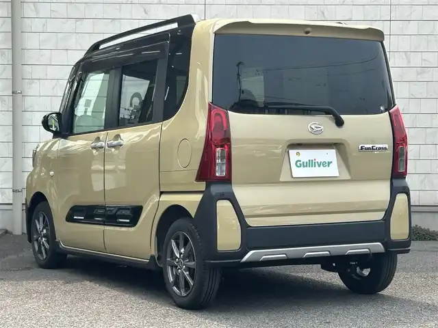 ダイハツ タント ファンクロス 大分県 2022(令4)年 2.1万km ブラックマイカメタリック/サンドベージュメタリック 両側パワースライドドア /USB/シートヒーター（D＋N席）/コーナーセンサー（前後）/オートライト/ルーフレール/LEDライト/純正14インチアルミホイル/アイドリングストップ/スペアキー/プッシュスタート/横滑り防止装置/衝突被害軽減装置/新車保証書/取扱説明書