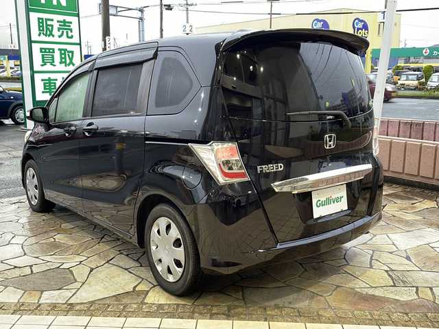 ホンダ フリード G ジャストセレクション 静岡県 2012(平24)年 7.5万km プレミアムブラキッシュパール 【主要装備】/社外ナビ　/片側パワースライドドア　/ＥＴＣ　/アルパイン後席フリップダウンモニター　/ナビ連動ドライブレコーダー　/横滑り防止機能　/Ｂｌｕｅｔｏｏｔｈ　/フルセグテレビ　/バックカメラ