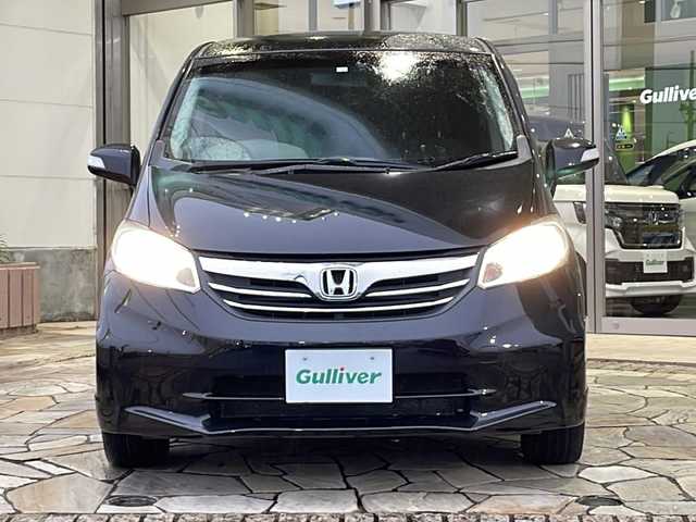 ホンダ フリード G ジャストセレクション 静岡県 2012(平24)年 7.5万km プレミアムブラキッシュパール 【主要装備】/社外ナビ　/片側パワースライドドア　/ＥＴＣ　/アルパイン後席フリップダウンモニター　/ナビ連動ドライブレコーダー　/横滑り防止機能　/Ｂｌｕｅｔｏｏｔｈ　/フルセグテレビ　/バックカメラ