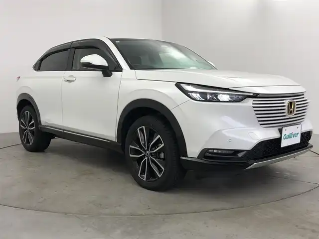 ホンダ ヴェゼル ハイブリッド e:HEV Z 愛知県 2023(令5)年 6万km プラチナホワイトパール ディスプレイオーディオ　/バックカメラ　/ハーフレザー　/シートヒーター　/ＥＴＣ２．０　/パドルシフト　/パワーバックドア　/ステアヒーター　/ＢＳＭ　/電子パーキング　/ＵＳＢ　/保証書　/取説　/記録簿　/スペアキー