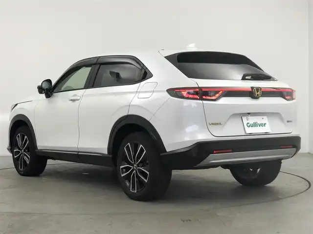 ホンダ ヴェゼル ハイブリッド e:HEV Z 愛知県 2023(令5)年 6万km プラチナホワイトパール ディスプレイオーディオ　/バックカメラ　/ハーフレザー　/シートヒーター　/ＥＴＣ２．０　/パドルシフト　/パワーバックドア　/ステアヒーター　/ＢＳＭ　/電子パーキング　/ＵＳＢ　/保証書　/取説　/記録簿　/スペアキー