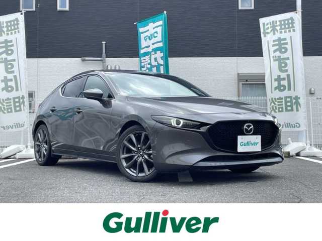 マツダ マツダ３ファストバック 20S バーガンディセレクション 三重県 2019(令1)年 3.4万km マシーングレープレミアムM 登録時34047km/禁煙車/BSM/純正ナビ(AM/FM/USB/HDMI/ワンセグ/Bluetooth)/全方位カメラ/レザーシート/LED/前席シートヒーター/運転席パワーシート/シートメモリ機能/ステアリングヒーター/オートライト/オートハイビーム/パドルシフト/レーダークルーズコントロール/前後ソナー/アイドリングストップ/オートホールドブレーキ/横滑り防止装置/プリクラッシュ/電子パーキング/プッシュスタート/スマートキー×2