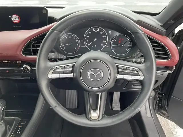 マツダ マツダ３ファストバック 20S バーガンディセレクション 三重県 2019(令1)年 3.4万km マシーングレープレミアムM 登録時34047km/禁煙車/BSM/純正ナビ(AM/FM/USB/HDMI/ワンセグ/Bluetooth)/全方位カメラ/レザーシート/LED/前席シートヒーター/運転席パワーシート/シートメモリ機能/ステアリングヒーター/オートライト/オートハイビーム/パドルシフト/レーダークルーズコントロール/前後ソナー/アイドリングストップ/オートホールドブレーキ/横滑り防止装置/プリクラッシュ/電子パーキング/プッシュスタート/スマートキー×2