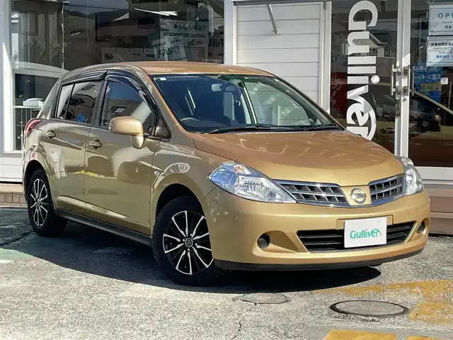 日産 ティーダ 15M 神奈川県 2011(平23)年 2.5万km メローゴールド 社外メモリナビ　/　（CD・Bluetooth）/ワンセグTV/ハーフレザーシート/電動格納ミラー/ETC/スマートキー×2/保証書/取扱説明書