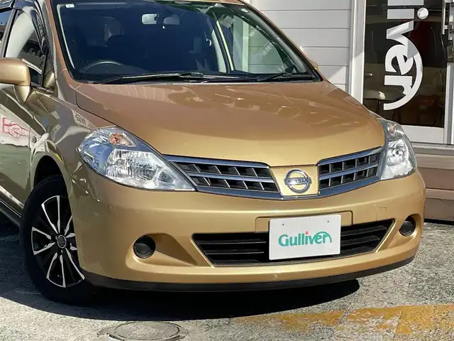 日産 ティーダ 15M 神奈川県 2011(平23)年 2.5万km メローゴールド 社外メモリナビ　/　（CD・Bluetooth）/ワンセグTV/ハーフレザーシート/電動格納ミラー/ETC/スマートキー×2/保証書/取扱説明書