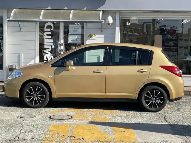 日産 ティーダ 15M 神奈川県 2011(平23)年 2.5万km メローゴールド 社外メモリナビ　/　（CD・Bluetooth）/ワンセグTV/ハーフレザーシート/電動格納ミラー/ETC/スマートキー×2/保証書/取扱説明書