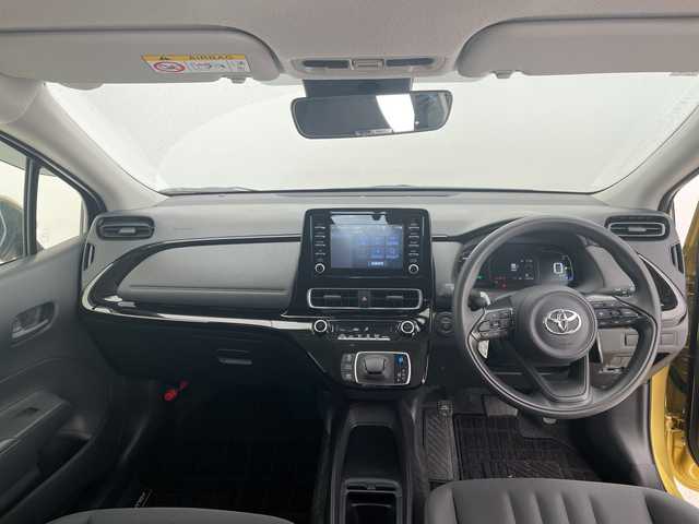 トヨタ アクア X 愛知県 2025(令7)年 0.3万km ブラスゴールドメタリック 純正ディズプレイオーディオ　ナビ機能なし/レーダークルーズコントロール/バックカメラ/コーナーセンサー/LEDヘッドライト/オートマチックハイビーム/ETC/衝突軽減システム/Bluetooth/ステアリングスイッチ/スマートキー/プッシュスタート