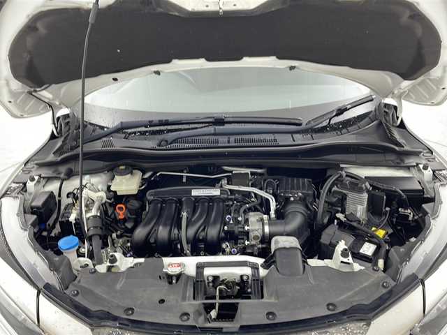 ホンダ ヴェゼル ハイブリッド X ホンダセンシング 宮城県 2018(平30)年 3.4万km プラチナホワイトパール 禁煙車/ホンダセンシング/・衝突軽減ブレーキ/・先行車発進お知らせ機能/・アダプティブクルーズコントロール/・標識認識機能/・車線維持支援システム/・路外逸脱抑制機能/純正7インチSDナビ/・BT/CD/DVD/USB/SD/HDMI/フルセグTV/バックカメラ/ビルトインETC/革巻きステアリング/ステアリングスイッチ/パドルシフト/プッシュスタート/スマートキー×2/LEDヘッドライト/LEDフォグランプ/純正16インチアルミホイール/純正フロアマット/横滑り防止装置/アイドリングストップ