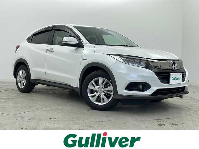 ホンダ ヴェゼル ハイブリッド X ホンダセンシング 宮城県 2018(平30)年 3.4万km プラチナホワイトパール 禁煙車/ホンダセンシング/・衝突軽減ブレーキ/・先行車発進お知らせ機能/・アダプティブクルーズコントロール/・標識認識機能/・車線維持支援システム/・路外逸脱抑制機能/純正7インチSDナビ/・BT/CD/DVD/USB/SD/HDMI/フルセグTV/バックカメラ/ビルトインETC/革巻きステアリング/ステアリングスイッチ/パドルシフト/プッシュスタート/スマートキー×2/LEDヘッドライト/LEDフォグランプ/純正16インチアルミホイール/純正フロアマット/横滑り防止装置/アイドリングストップ