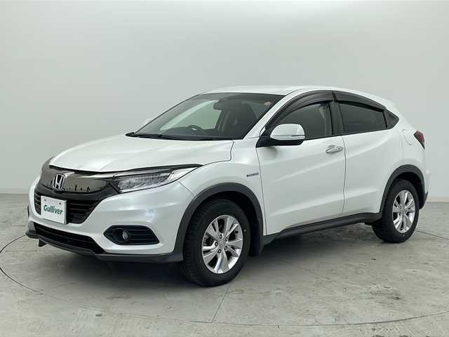 ホンダ ヴェゼル ハイブリッド X ホンダセンシング 宮城県 2018(平30)年 3.4万km プラチナホワイトパール 禁煙車/ホンダセンシング/・衝突軽減ブレーキ/・先行車発進お知らせ機能/・アダプティブクルーズコントロール/・標識認識機能/・車線維持支援システム/・路外逸脱抑制機能/純正7インチSDナビ/・BT/CD/DVD/USB/SD/HDMI/フルセグTV/バックカメラ/ビルトインETC/革巻きステアリング/ステアリングスイッチ/パドルシフト/プッシュスタート/スマートキー×2/LEDヘッドライト/LEDフォグランプ/純正16インチアルミホイール/純正フロアマット/横滑り防止装置/アイドリングストップ