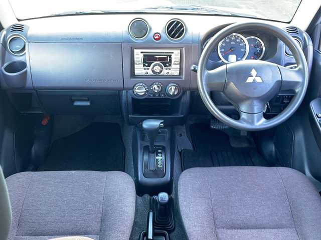 三菱 パジェロ ミニ VR 福井県 2010(平22)年 2.6万km クールシルバーM/ネアーズブルー 登録時走行距離25389ｋｍ/４WD/ターボ/ドライブレコーダー/背面タイヤ/社外15インチアルミホイール/キーレスキー/純正オーディオ/ライトレベライザー/ドアバイザー/電動格納ミラー/保証書/取扱説明書