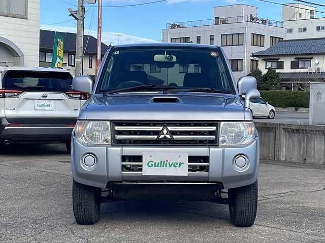 三菱 パジェロ ミニ VR 福井県 2010(平22)年 2.6万km クールシルバーM/ネアーズブルー 登録時走行距離25389ｋｍ/４WD/ターボ/ドライブレコーダー/背面タイヤ/社外15インチアルミホイール/キーレスキー/純正オーディオ/ライトレベライザー/ドアバイザー/電動格納ミラー/保証書/取扱説明書