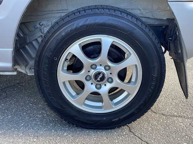 三菱 パジェロ ミニ VR 福井県 2010(平22)年 2.6万km クールシルバーM/ネアーズブルー 登録時走行距離25389ｋｍ/４WD/ターボ/ドライブレコーダー/背面タイヤ/社外15インチアルミホイール/キーレスキー/純正オーディオ/ライトレベライザー/ドアバイザー/電動格納ミラー/保証書/取扱説明書