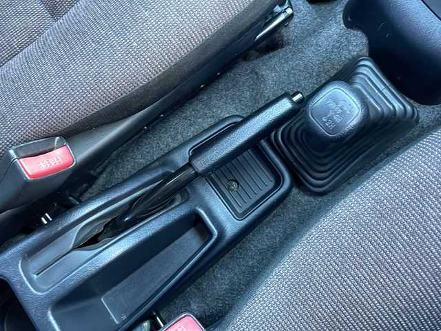 三菱 パジェロ ミニ VR 福井県 2010(平22)年 2.6万km クールシルバーM/ネアーズブルー 登録時走行距離25389ｋｍ/４WD/ターボ/ドライブレコーダー/背面タイヤ/社外15インチアルミホイール/キーレスキー/純正オーディオ/ライトレベライザー/ドアバイザー/電動格納ミラー/保証書/取扱説明書