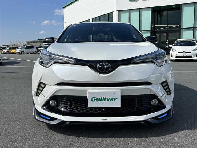 トヨタ Ｃ－ＨＲ G 奈良県 2017(平29)年 9.6万km ホワイトパールクリスタルシャイン 純正９インチナビ　/フルセグＴＶ　/BT/CD/DVD/USB/SD/モデリスタフルエアロ　/ビルトイン２．０ＥＴＣ　/前後ドライブレコーダー　/前後コーナーセンサー　/バックフロントカメラ　/追従型クルーズコントロール　/ハーフレザーシート/シートヒーター　/ＨＯＬＤ/スマートキー/社外17インチアルミホイール/純正フロアマット/衝突被害軽減システム/レーンキープアシスト/横滑り防止装置/盗難防止装置/LEDヘッドライト/オートマチックハイビーム