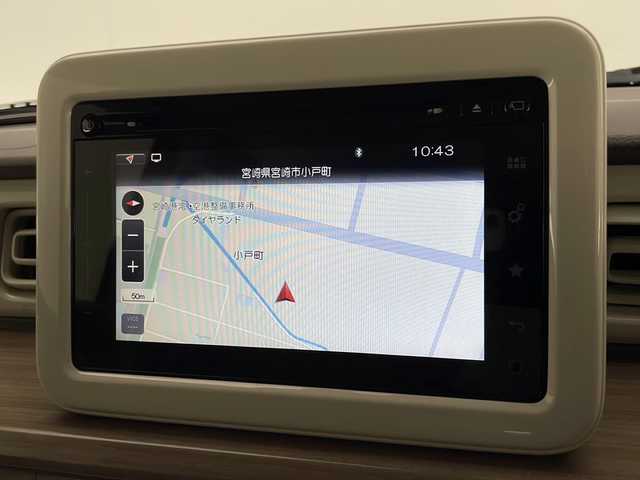 スズキ ラパン X 宮崎県 2015(平27)年 2.4万km カシスピンクパールメタリック 禁煙車/衝突被害軽減ブレーキ/純正ナビTV/（スマホ連携ナビ/AUX/USB/FMAM/Bluetooth/フルセグTV)/純正ビルトインETC/純正ドライブレコーダー/純正セキュリティアラーム/純正キセノンオートライト/純正フォグ/純正リアラゲージマット/純正フロアマット/ウインカードアミラー/シートヒーター/オートエアコン/本革巻ハンドル/ブルーレインミラー/リアプライバシーガラス/スマートキー/プッシュエンジンスタート/スペアキー/新車時保証書/取扱い説明書