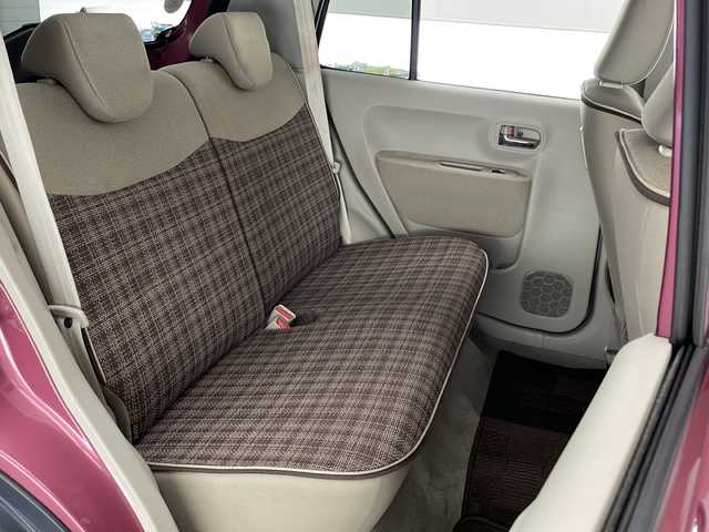 スズキ ラパン X 宮崎県 2015(平27)年 2.4万km カシスピンクパールメタリック 禁煙車/衝突被害軽減ブレーキ/純正ナビTV/（スマホ連携ナビ/AUX/USB/FMAM/Bluetooth/フルセグTV)/純正ビルトインETC/純正ドライブレコーダー/純正セキュリティアラーム/純正キセノンオートライト/純正フォグ/純正リアラゲージマット/純正フロアマット/ウインカードアミラー/シートヒーター/オートエアコン/本革巻ハンドル/ブルーレインミラー/リアプライバシーガラス/スマートキー/プッシュエンジンスタート/スペアキー/新車時保証書/取扱い説明書