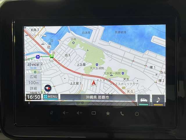スズキ スペーシア HYBRID X 沖縄県 2024(令6)年 0.1万km ピュアホワイトP 県外仕入　/禁煙車　/純正９インチメーカーナビ/（ＢＴ，フルセグ，ＵＳＢ，ラジオ，ＣａｒＰｌａｙ）　/全方位モニター　/両側パワースライドドア　/後席オットマン　/アダプティブクルーズコントロール　/電子パーキングブレーキ　/ＵＳＢポート/シートバックテーブル/コーナーセンサー/デュアルセンサーブレーキサポート２/ハイビームアシスト/車線逸脱警報機能/標識認識機能/純正フロアマット/ドアバイザー/シートヒーター/スペアキー