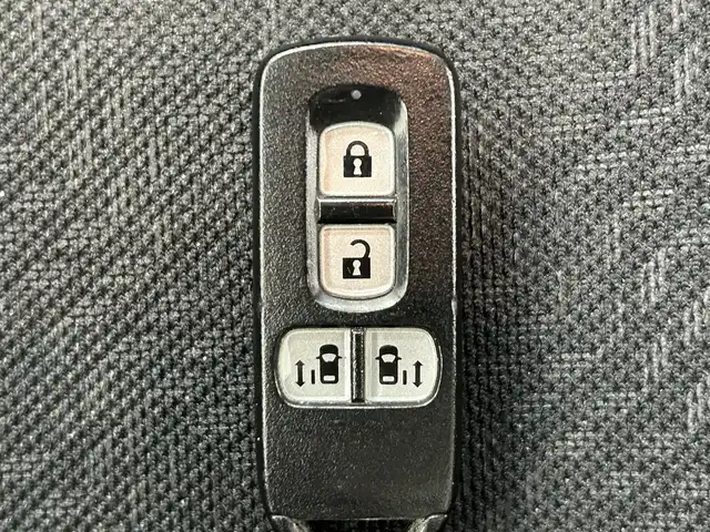 ホンダ Ｎ ＢＯＸ カスタム G Lパッケージ 熊本県 2012(平24)年 6.6万km プレミアムダイナミックブルーパール 純正ナビVXM-128VSXi（ＣＤ・ＤＶＤ・フルセグ・ＢＴ・ＳＤ・ｉｐｏｄ・ＵＳＢ）/バックカメラ　/ＥＴＣ/両側パワースライドドア　/アイドリングストップ　/横滑り防止　/純正フロアマット/純正１４インチAW/ドアバイザー/オートライト　/ＬＥＤヘッドライト　/スマートキー/プッシュスタート/取扱説明書