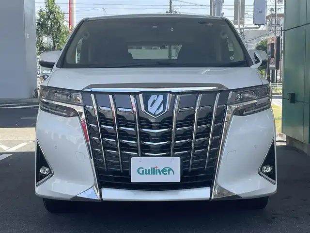 トヨタ アルファードハイブリット X 愛知県 2022(令4)年 4.6万km ホワイトパールクリスタルシャイン ワンオーナー/４WD/両側パワースライドドア/純正9型ディスプレイナビ/・Bluetooth／地デジTV／Miracast/バックカメラ/デジタルインナーミラー〈MOP〉/Toyota Safety Sense/・プリクラッシュセーフティ/・レーントレーシングアシスト/・オートマチックハイビーム/・ロードサインアシスト/・レーダークルーズコントロール（全車速追従機能付）/・先行車発進告知機能/ブラインドスポットモニター〈MOP〉/クリアランスソナー/LEDヘッドライト/社外キルティング調シートカバー/前後ドライブレコーダー（DC-DR652）/純正16インチAW〈スペアタイヤ有〉