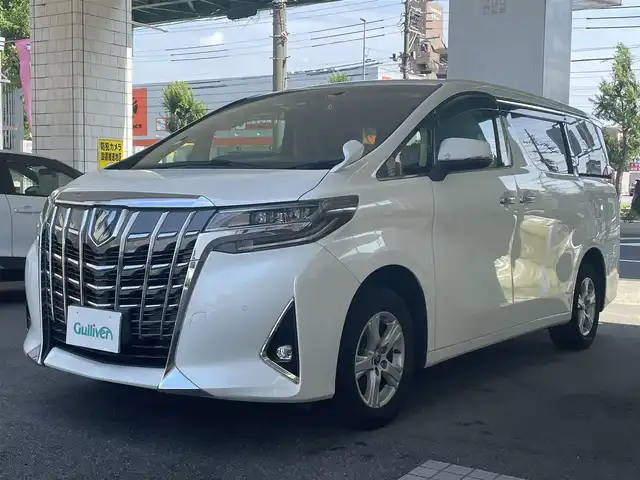 トヨタ アルファードハイブリット X 愛知県 2022(令4)年 4.6万km ホワイトパールクリスタルシャイン ワンオーナー/４WD/両側パワースライドドア/純正9型ディスプレイナビ/・Bluetooth／地デジTV／Miracast/バックカメラ/デジタルインナーミラー〈MOP〉/Toyota Safety Sense/・プリクラッシュセーフティ/・レーントレーシングアシスト/・オートマチックハイビーム/・ロードサインアシスト/・レーダークルーズコントロール（全車速追従機能付）/・先行車発進告知機能/ブラインドスポットモニター〈MOP〉/クリアランスソナー/LEDヘッドライト/社外キルティング調シートカバー/前後ドライブレコーダー（DC-DR652）/純正16インチAW〈スペアタイヤ有〉
