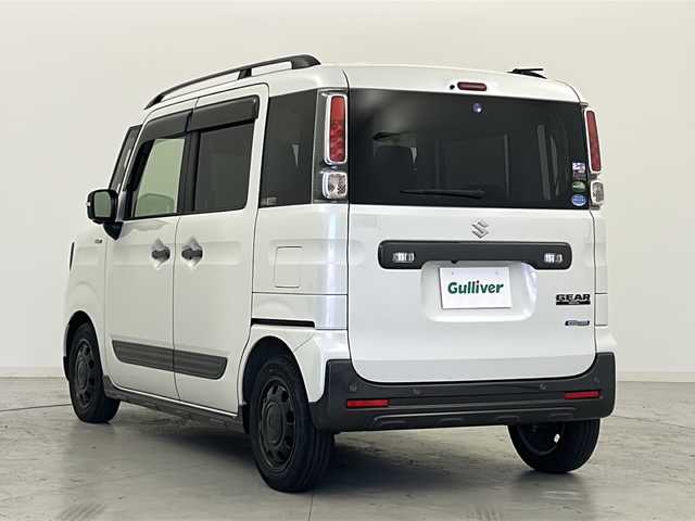 スズキ スペーシア ギア HYBRID XZターボ 宮城県 2019(令1)年 2.2万km ピュアホワイトP 禁煙車/スズキセーフティサポート/・車線逸脱抑制制御機能/・パーキングソナー/・横滑り防止装置/・ハイビームアシスト/・デュアルセンサーブレーキサポート/両側パワースライドドア/全周囲カメラ/純正8型ナビ/【地図SDカード無し】/・BT.CD.DVD.SD.USB/フルセグTV/前席シートヒーター/ビルトインETC/ドライブレコーダー(F.R)/ステアリングスイッチ/パドルシフト/革巻ステアリング/プッシュスタート/スマートキー×2/純正フロアマット/純正14インチAW/純正ドアバイザー/LEDヘッドライト/フォグランプ/ロールサンシェード/シートバックテーブル/横滑り防止機能