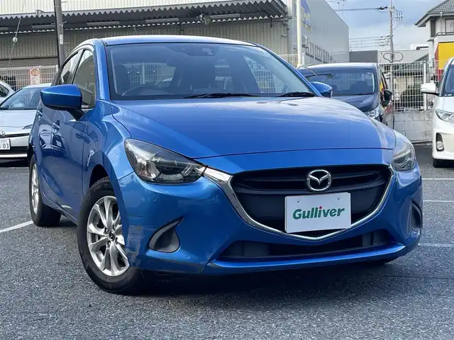 マツダ デミオ 13S 千葉県 2015(平27)年 3.8万km ダイナミックブルーマイカ 純正ディーラーナビ(AM/FM/CD/DVD/BT/フルセグ/USB)/LEDコンフォートパッケージ/スポーティパッケージ/バックカメラ/アイドリングストップ/横滑り防止機能/MT付オートマチック/ステアリングリモコン/LEDヘッドライト/電動格納ミラー/純正フロアマット/USB挿し口/シガーソケット