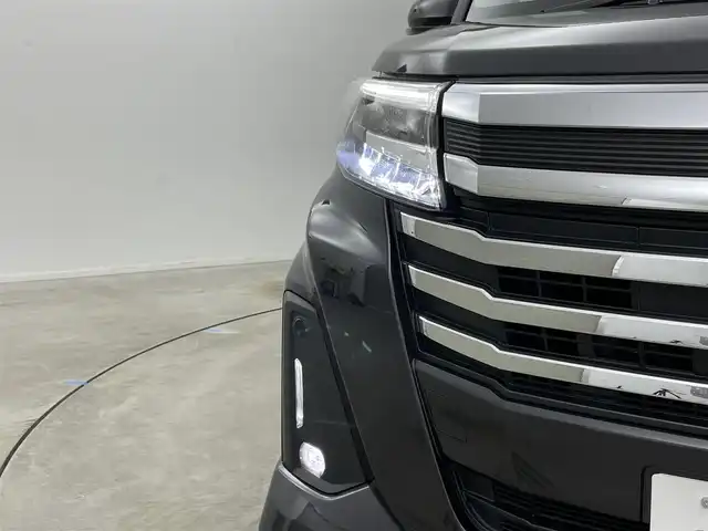 トヨタ ルーミー カスタムG－T 岡山県 2023(令5)年 1.8万km ブラックマイカメタリック 純正ナビ（NSZT-W68T）/【Bluetooth/フルセグTV/CD/DVD】/バックカメラ/両側電動スライドドア/追従型クルーズコントロール/コーナーセンサー（前/後）/衝突軽減ブレーキ/ビルトインＥＴＣ/ドライブレコーダー（前）/純正１５インチＡＷ/ＬＥＤヘッドライト/オートライト/フォグランプ/純正フロアマット/オートブレーキホールド/禁煙車/スマートキー