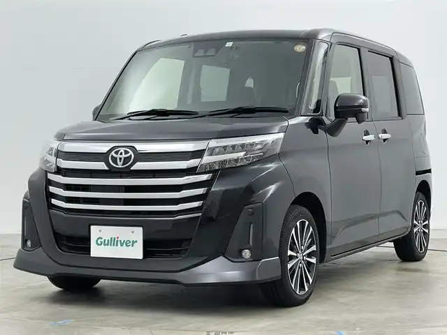 トヨタ ルーミー カスタムG－T 岡山県 2023(令5)年 1.8万km ブラックマイカメタリック 純正ナビ（NSZT-W68T）/【Bluetooth/フルセグTV/CD/DVD】/バックカメラ/両側電動スライドドア/追従型クルーズコントロール/コーナーセンサー（前/後）/衝突軽減ブレーキ/ビルトインＥＴＣ/ドライブレコーダー（前）/純正１５インチＡＷ/ＬＥＤヘッドライト/オートライト/フォグランプ/純正フロアマット/オートブレーキホールド/禁煙車/スマートキー