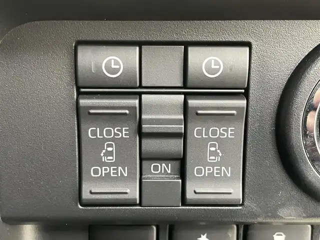 トヨタ ルーミー カスタムG－T 岡山県 2023(令5)年 1.8万km ブラックマイカメタリック 純正ナビ（NSZT-W68T）/【Bluetooth/フルセグTV/CD/DVD】/バックカメラ/両側電動スライドドア/追従型クルーズコントロール/コーナーセンサー（前/後）/衝突軽減ブレーキ/ビルトインＥＴＣ/ドライブレコーダー（前）/純正１５インチＡＷ/ＬＥＤヘッドライト/オートライト/フォグランプ/純正フロアマット/オートブレーキホールド/禁煙車/スマートキー